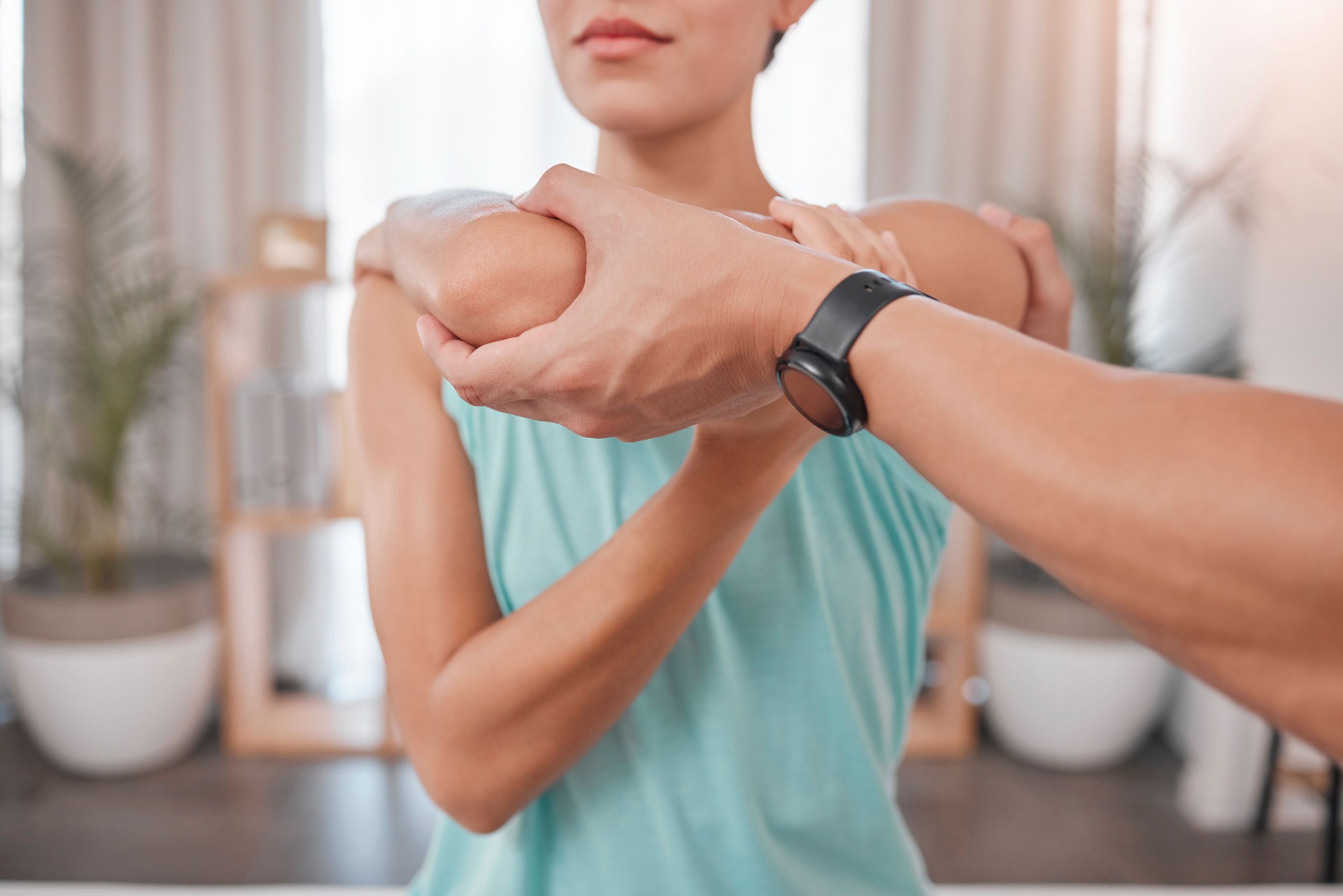 Exercise, physiotherapy and stretching with a physiotherapist or chiropractor for rehabilitation of the arms with a professional therapist. Chiropractic, healthcare and healing body of woman
